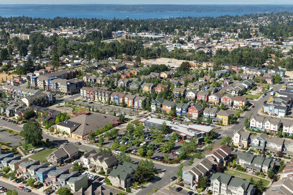 Aerial of the Greenbridge neighborhood with Puget Sound in the distance
