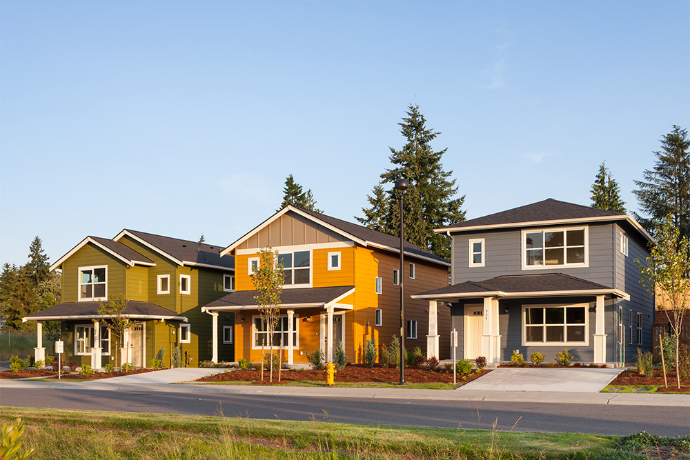 Three colorful for-sale homes