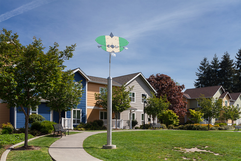 Row of homes with trees in front